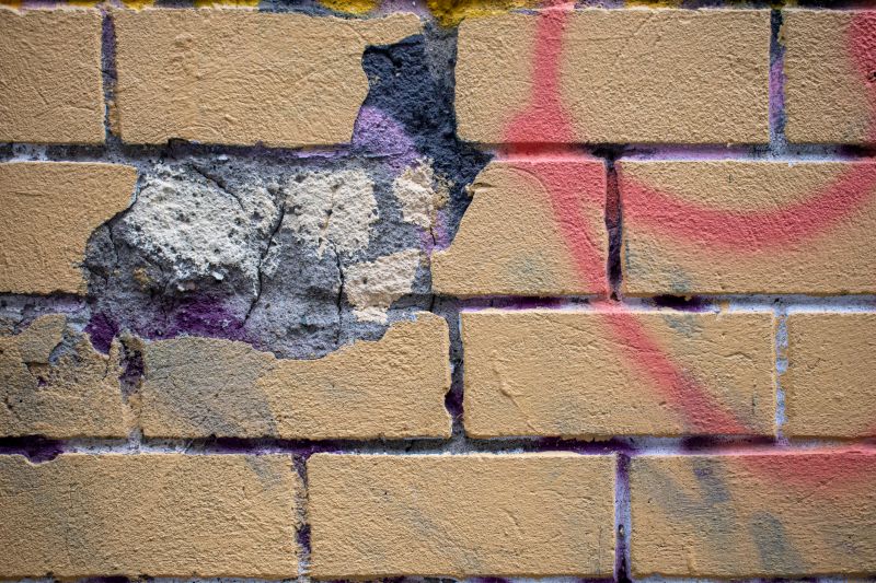 Before and After Building Graffiti Removal